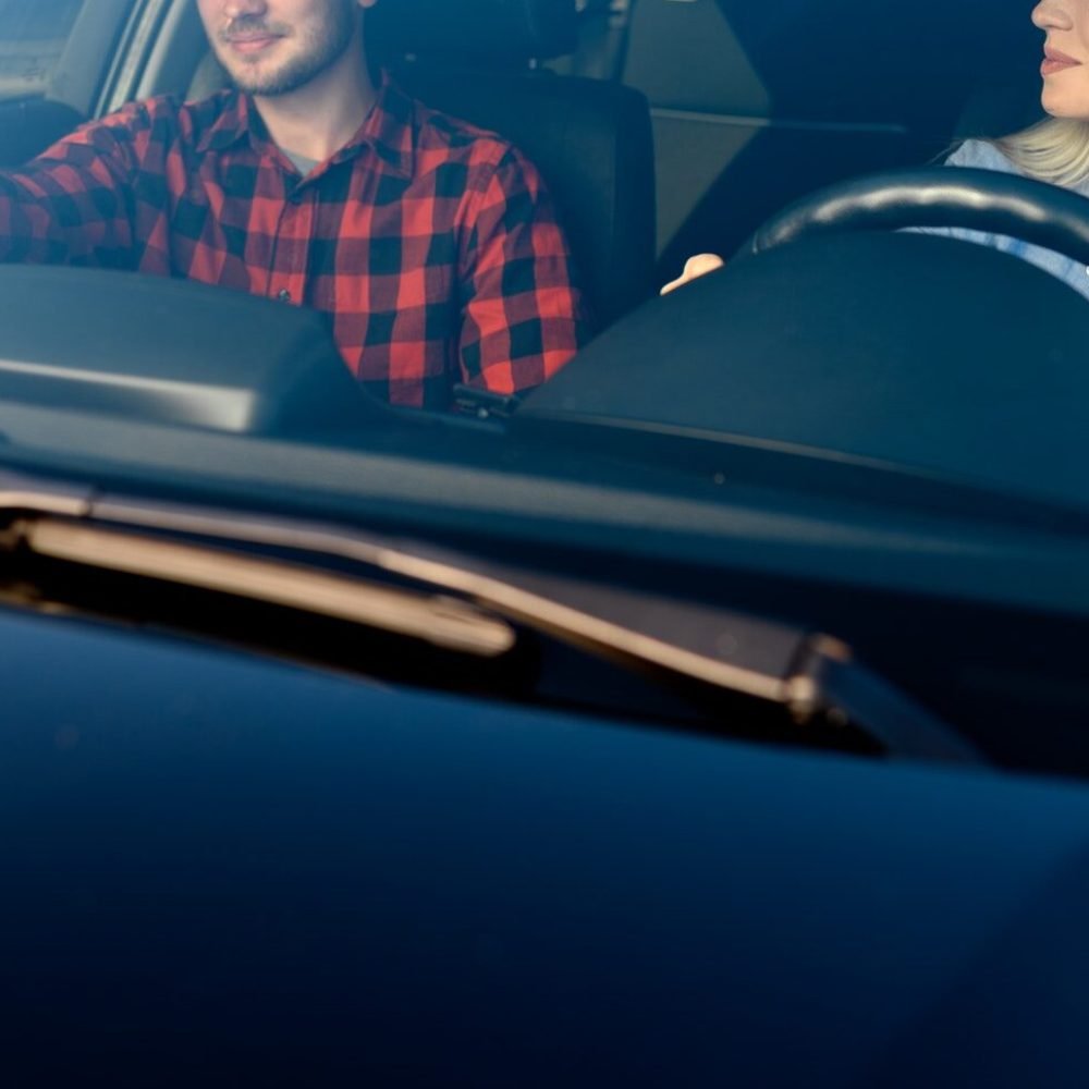 lady-and-male-instructor-in-car-driving-school.jpg